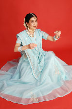 Dancing form in light blue costume by Nalini Toshniwal 